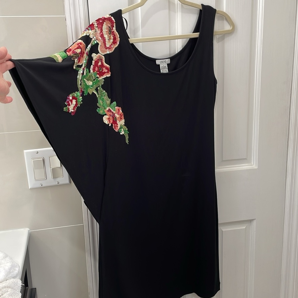 Black Cache Dress with shoulder detail
